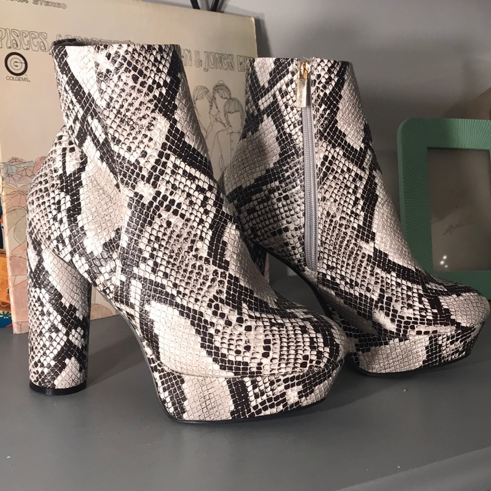 Snakeskin platform booties